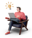 A man sits in a chair and works on a laptop